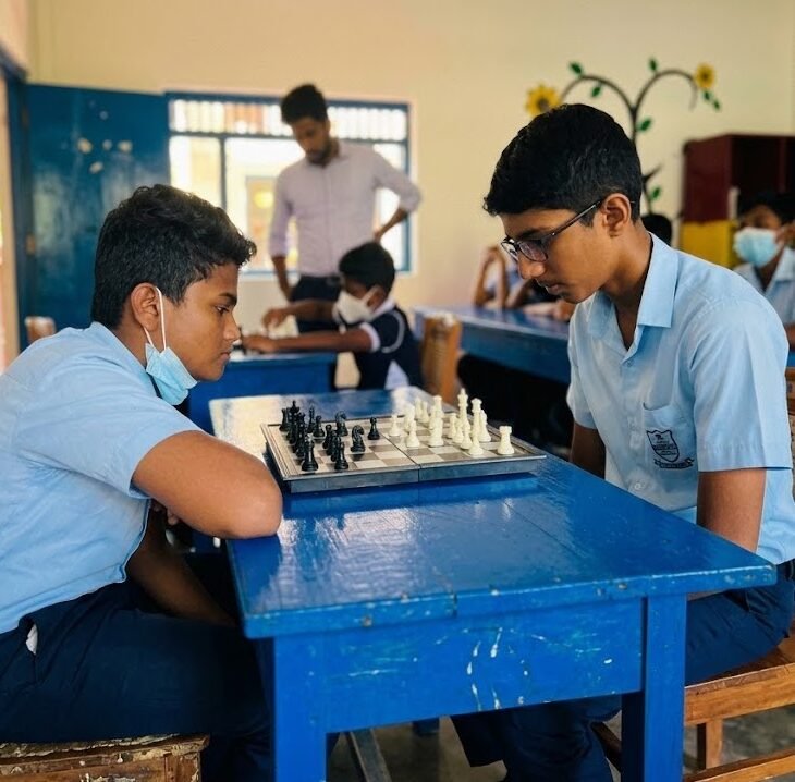 Students playing chess at Cambridge International School